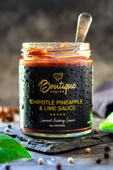 Chipotle Pineapple & Lime Sauce in a jar by Boutique Sauces. A smoky and spicy chipotle sauce with sweet pineapple and zesty lime, perfect for grilled meats, tacos, and burgers.