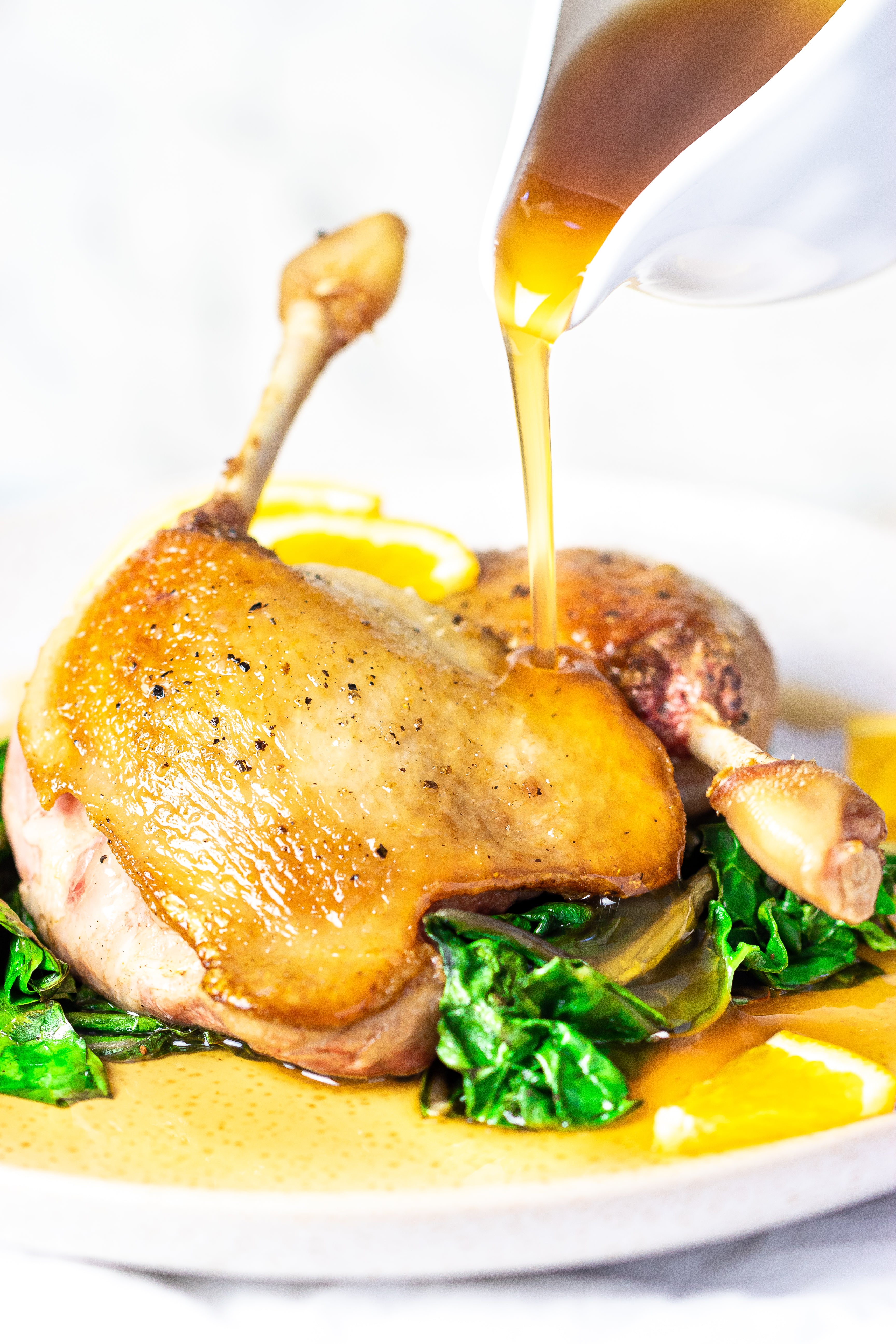 Crispy duck leg with Orange Star Anise Sauce by Boutique Sauces. A sweet and tangy sauce with anise & cinnamon, available in a jar for easy gourmet cookin