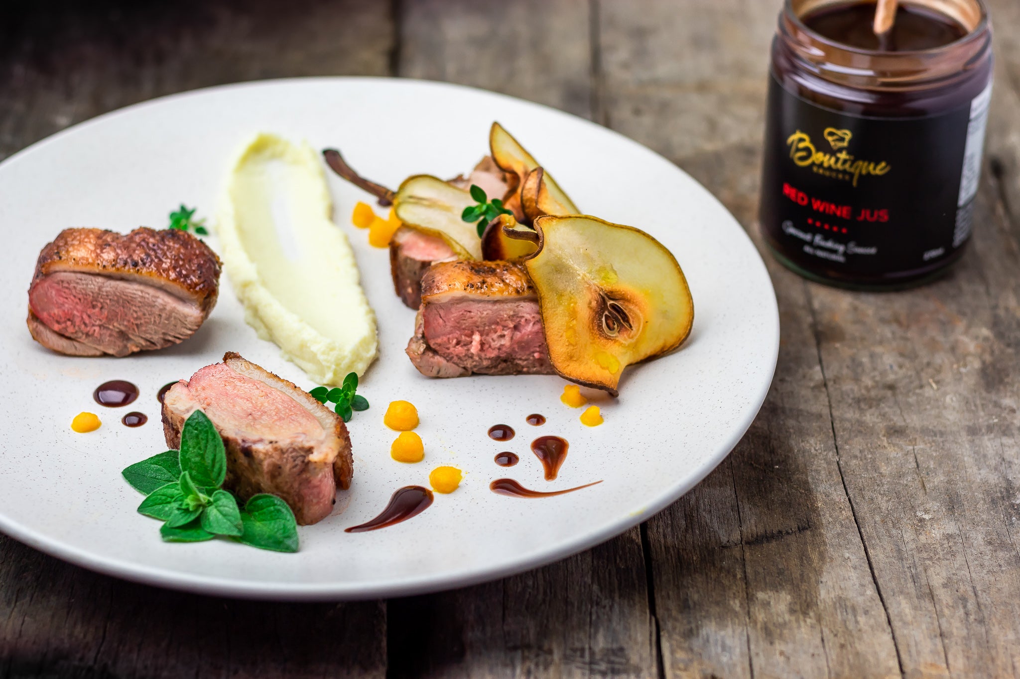 Seared duck breast with red wine jus, crispy skin, and a rich, velvety sauce. A gourmet dish enhanced by Boutique Sauces Red Wine Jus