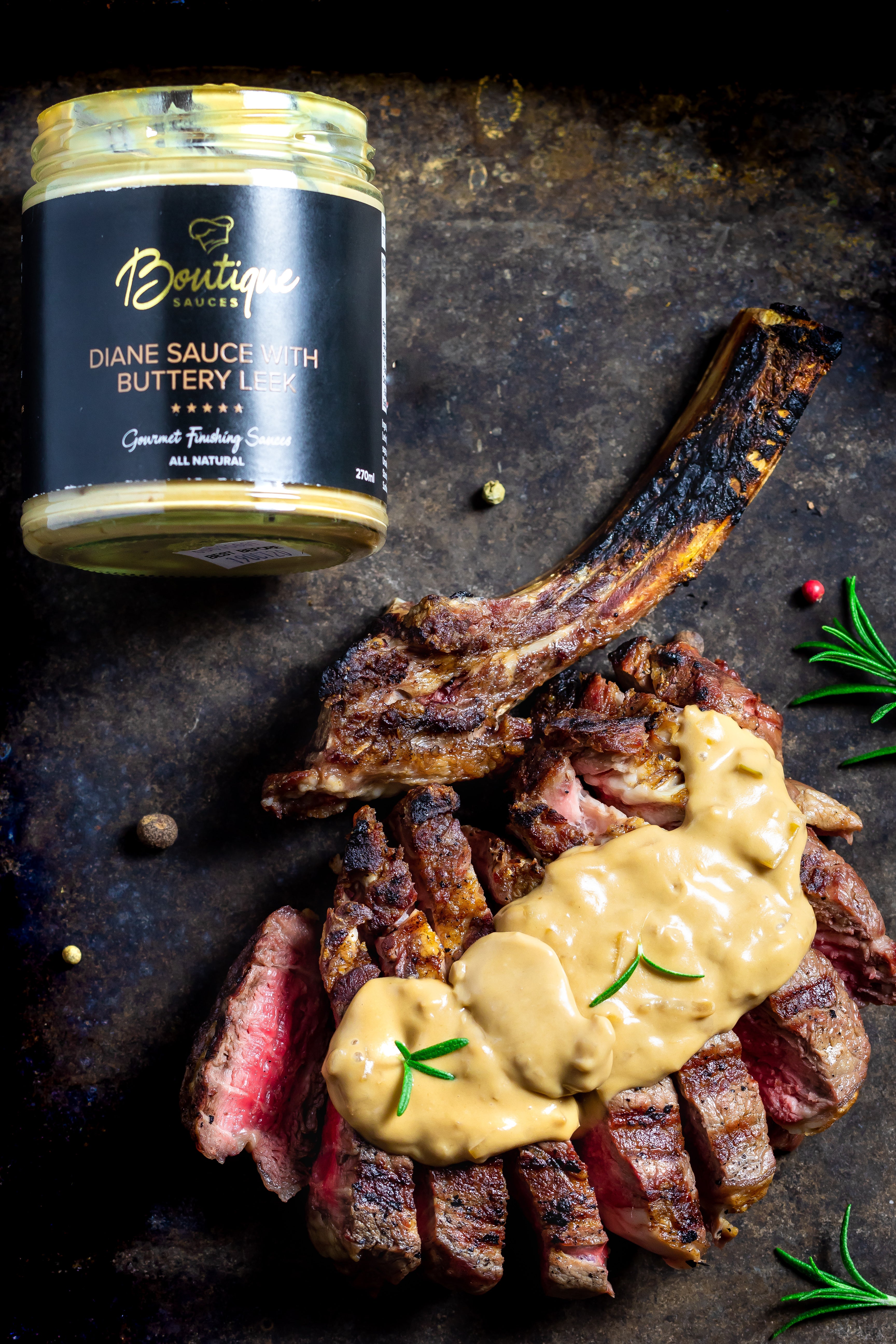 Perfectly seared steak drizzled with creamy Diane sauce with buttery leek by Boutique Sauces. A gourmet steak sauce for a rich and flavorful finish.