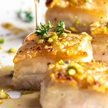 Roasted Pork Belly with Orange Star Anise Sauce & Pistachio Crumble