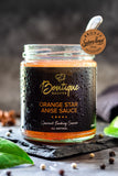 Orange Star Anise Sauce jar by Boutique Sauces with its award medal. Chef-made sweet and tangy sauce for duck and pork.
